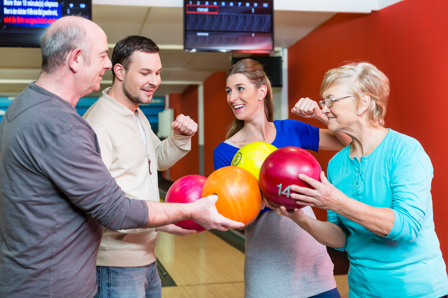 family-bowling-having-fun