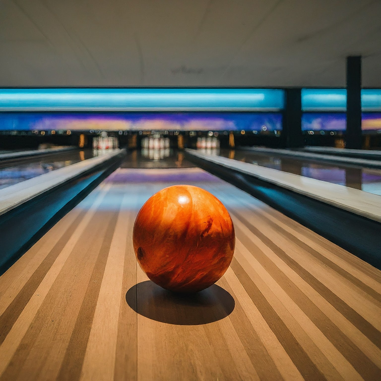 Bowling ball rolling down the bowling lane